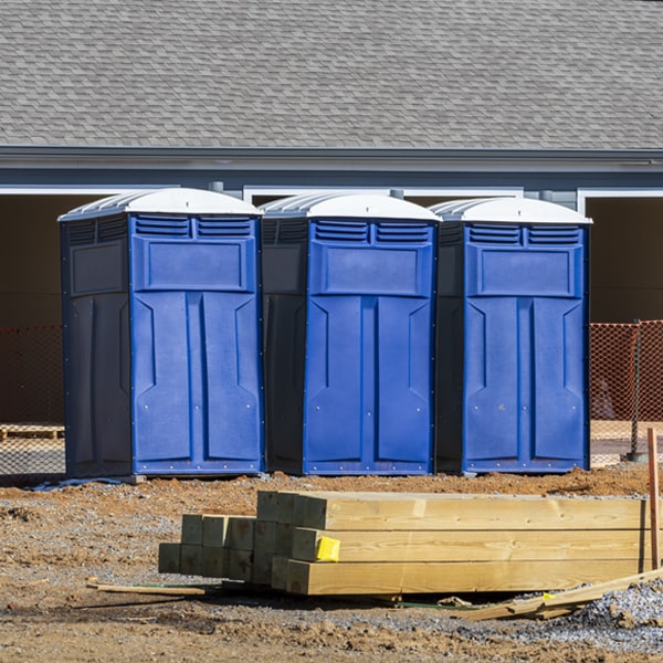 what is the cost difference between standard and deluxe portable toilet rentals in French Lick